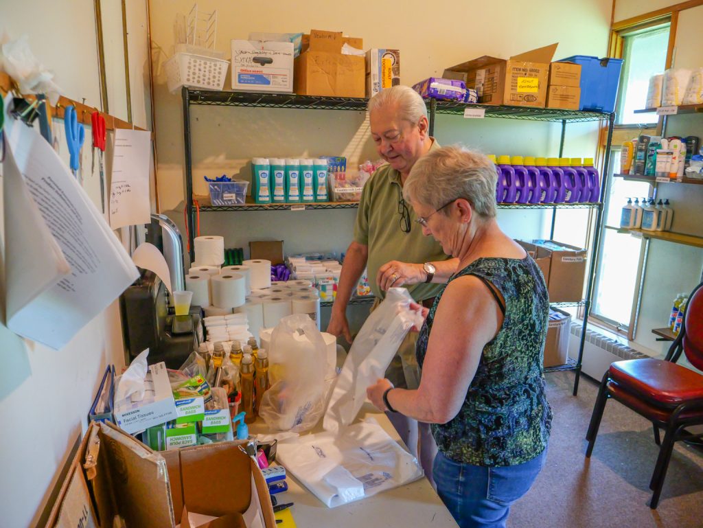 Two people working in the pantry